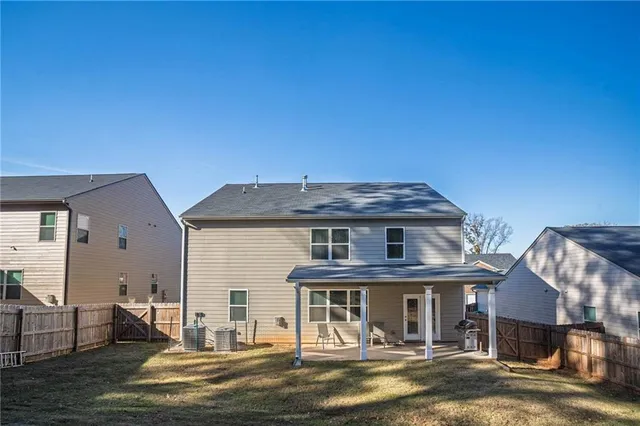 a front view of a house with a patio