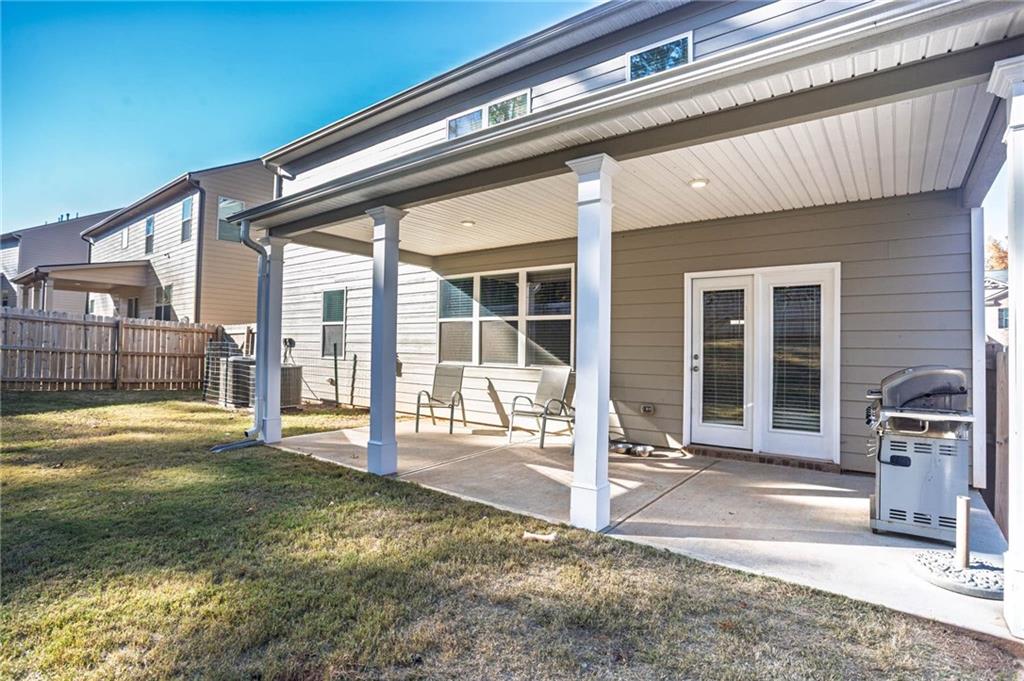 5381 Flat Rock Point Stonecrest, GA 30038 - Photo 47 of 53 a front view of a house with a patio