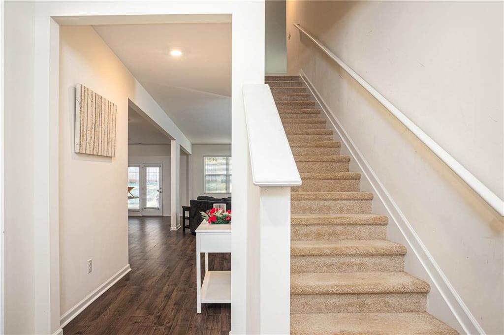5381 Flat Rock Point Stonecrest, GA 30038 - Photo 6 of 53 a view of entryway and hall with wooden floor