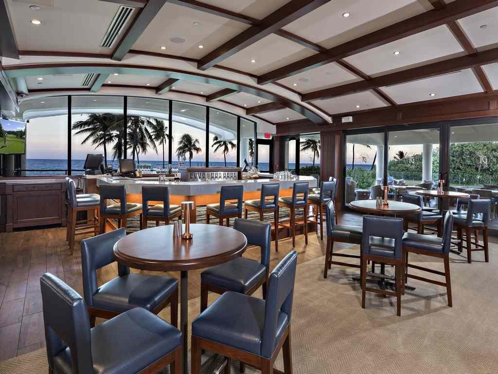 2160 Golfview Lane Stuart, FL 34996 - Photo 25 of 39 a dining area with furniture and a table