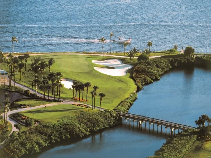 2160 Golfview Lane Stuart, FL 34996 - Photo 27 of 39 a view of a swimming pool with lawn chairs
