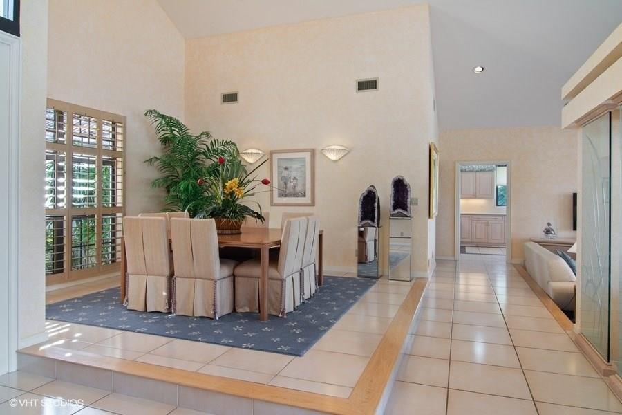 2160 Golfview Lane Stuart, FL 34996 - Photo 3 of 39 a view of a porch with furniture and front door