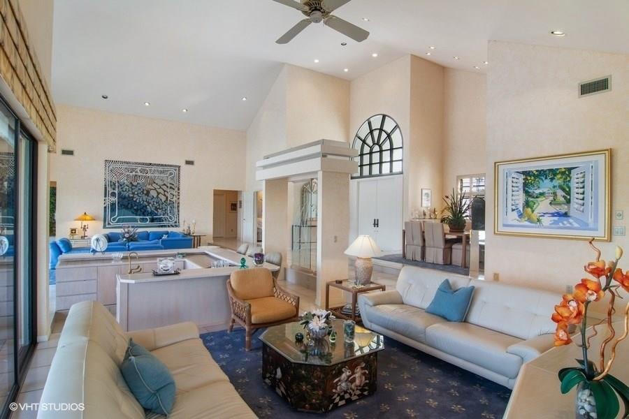 2160 Golfview Lane Stuart, FL 34996 - Photo 4 of 39 a living room with furniture and a large window