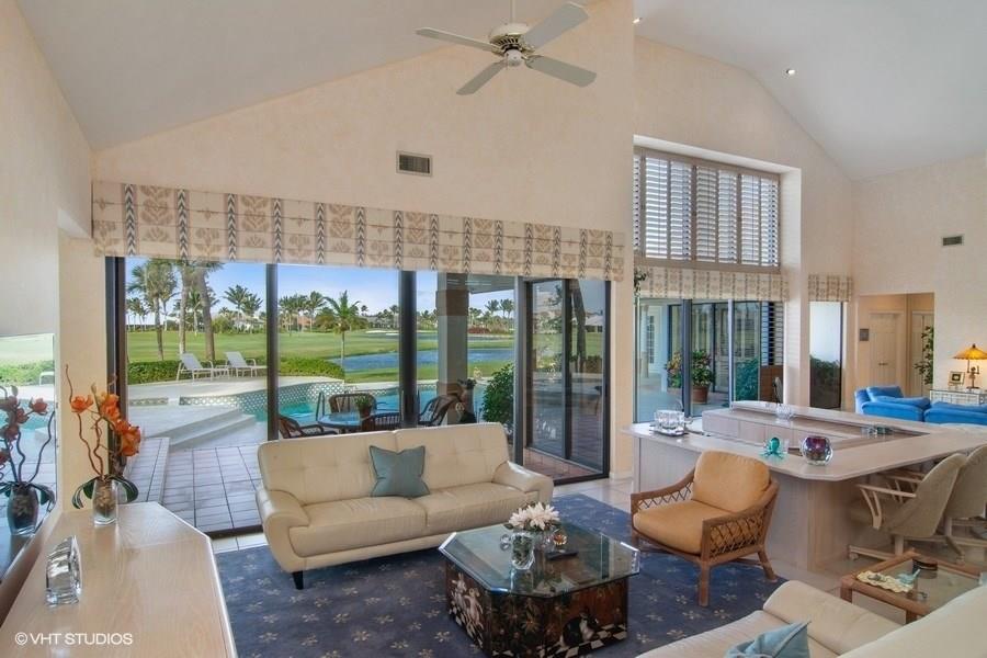 2160 Golfview Lane Stuart, FL 34996 - Photo 5 of 39 a living room with furniture and a large window