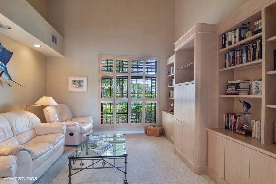 2160 Golfview Lane Stuart, FL 34996 - Photo 7 of 39 a living room with furniture and a window