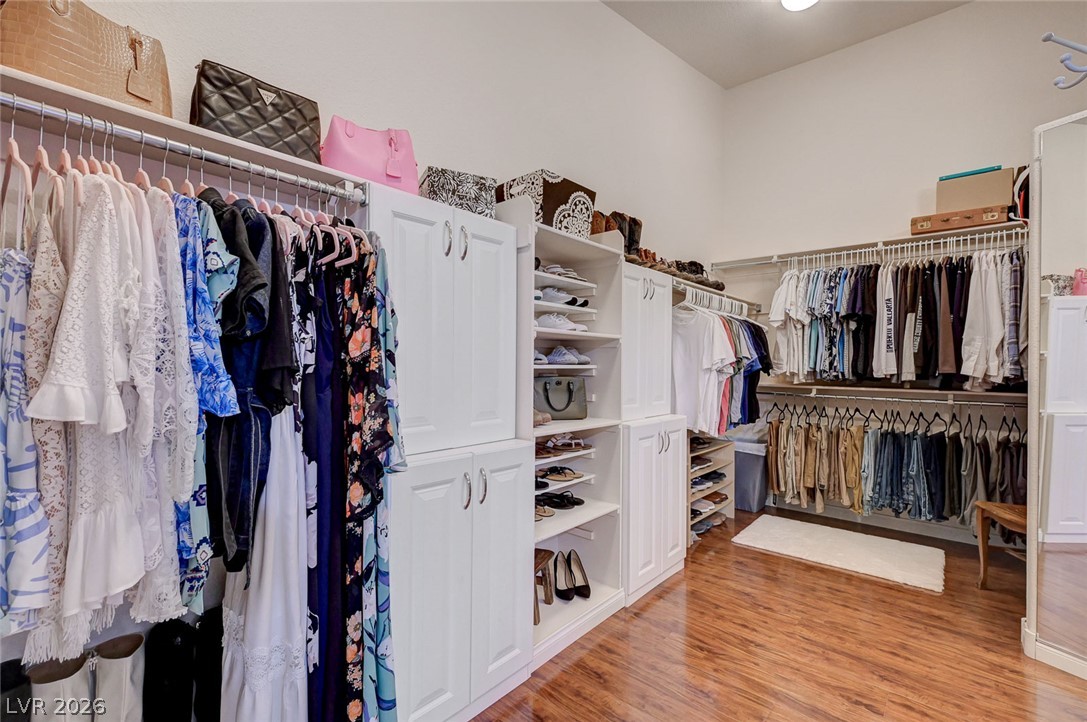 1604 Cattle Ranch Place Henderson, NV 89002 - Photo 48 of 99 Custom built-in storage solutions elevate this closet's organizational prowess.