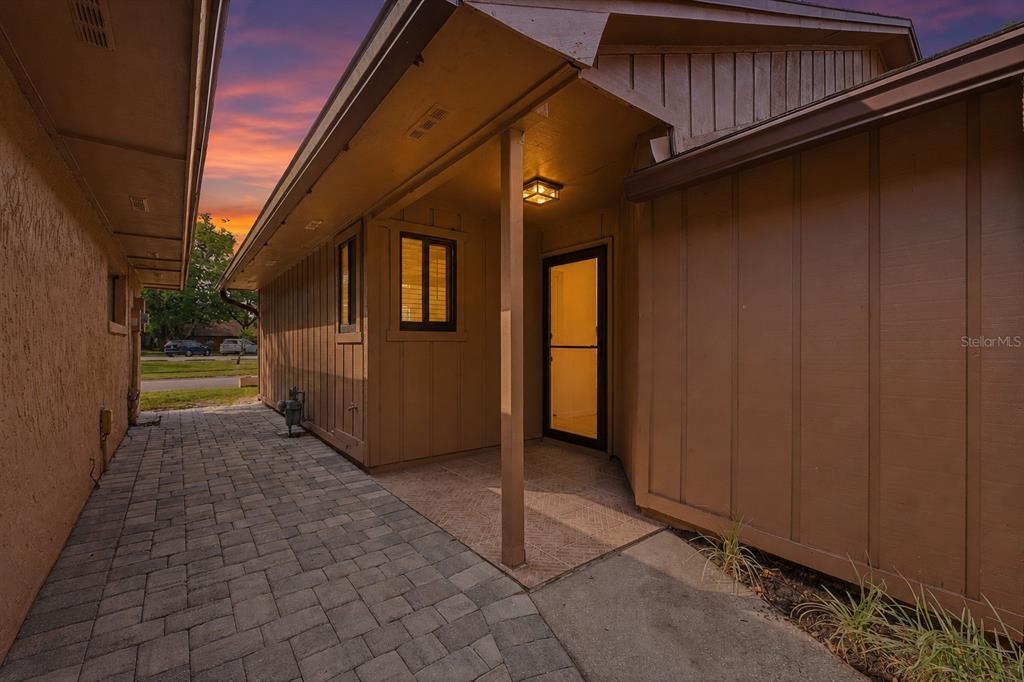 141 Spring Wind Way Casselberry, FL 32707 - Photo 1 of 32 a view of a house with backyard and porch