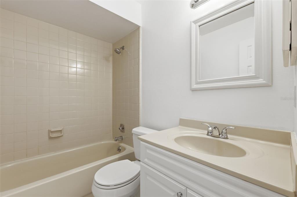 141 Spring Wind Way Casselberry, FL 32707 - Photo 20 of 32 a bathroom with a sink toilet and shower