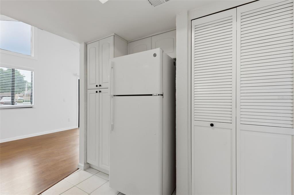 141 Spring Wind Way Casselberry, FL 32707 - Photo 22 of 32 a white refrigerator freezer sitting inside of a kitchen