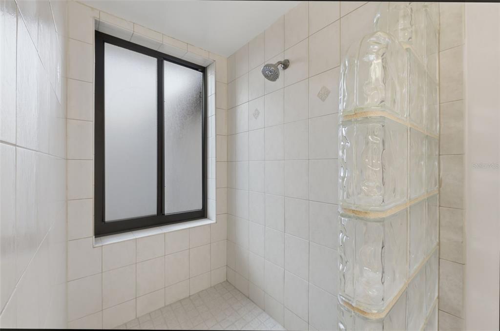 141 Spring Wind Way Casselberry, FL 32707 - Photo 25 of 32 a bathroom with a mirror