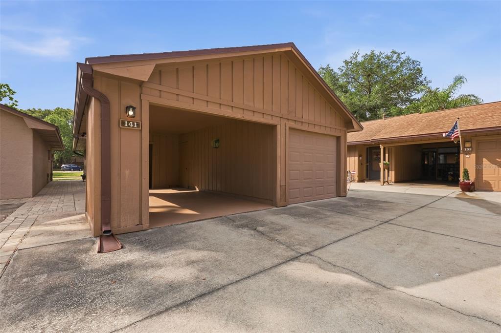 141 Spring Wind Way Casselberry, FL 32707 - Photo 28 of 32 a view of a house with a garage