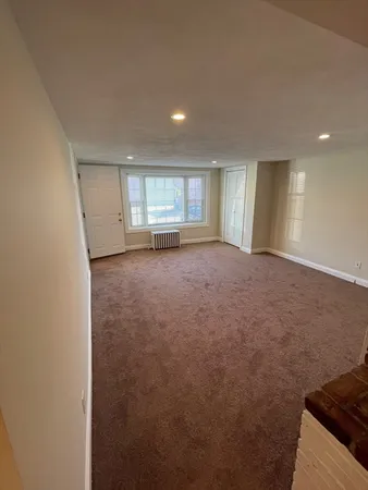 a view of a livingroom with a staircase