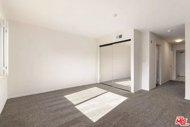 an empty room with an entryway
