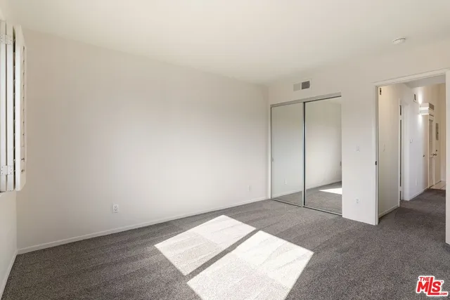 an empty room with an entryway