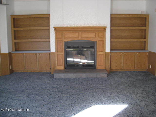 10748 Boddens Road Jacksonville, FL 32219 - Photo 17 of 31 17 living room fireplace and built ins