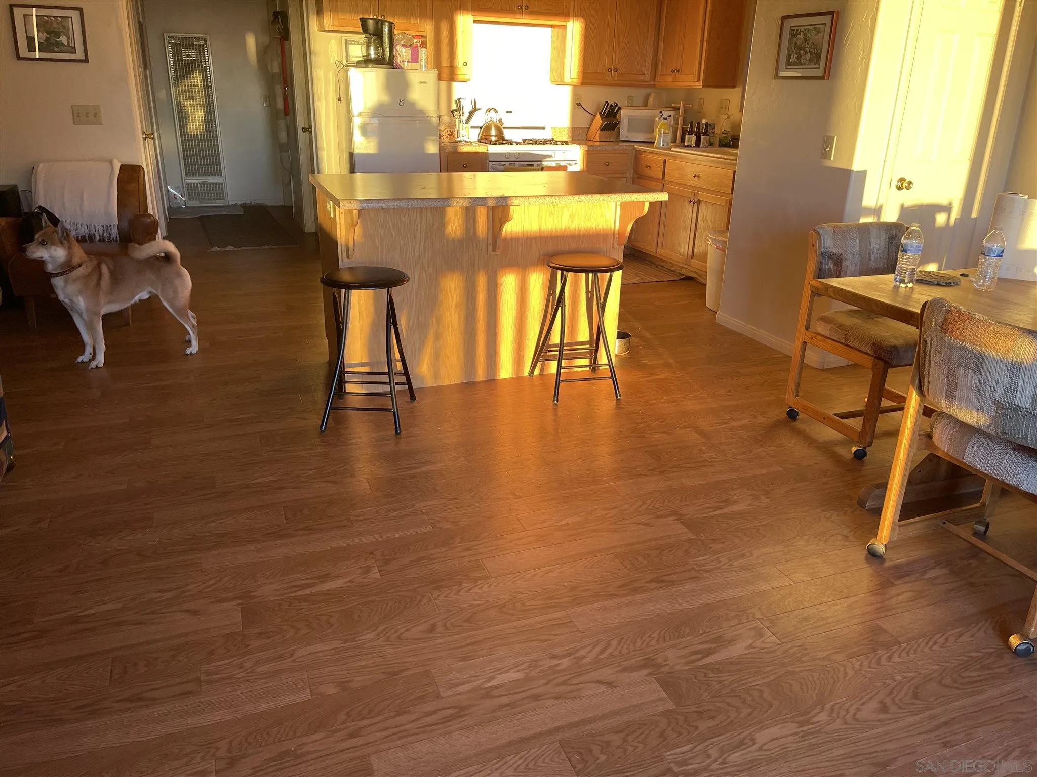 5885 Grandview Road Julian, CA 92036 - Photo 2 of 12 a dining room with furniture and wooden floor