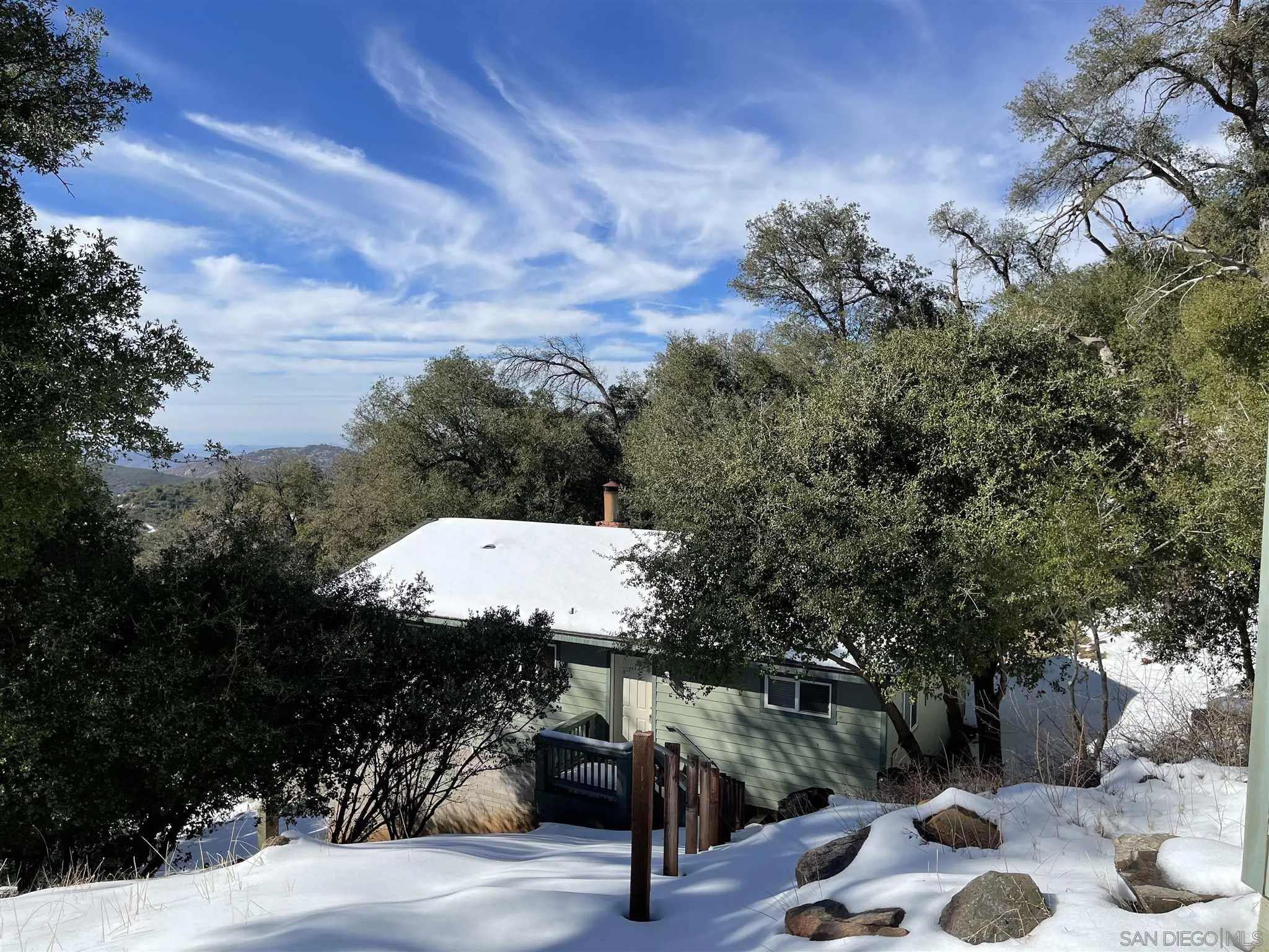 5885 Grandview Road Julian, CA 92036 - Photo 4 of 12 a view of a terrace with a bench and a fire pit