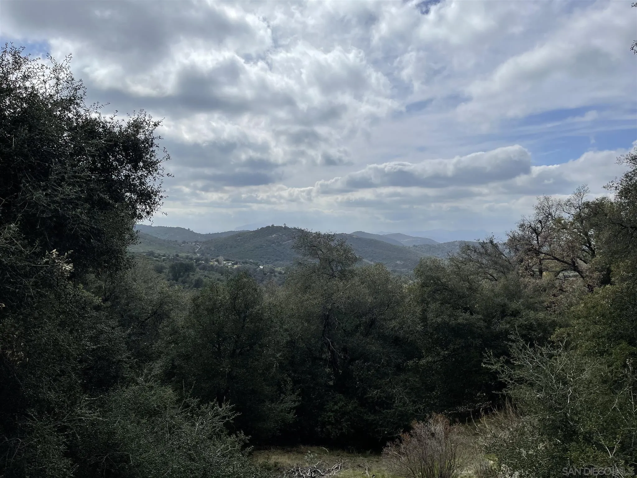 5885 Grandview Road Julian, CA 92036 - Photo 7 of 12 a view of a city with lush green forest