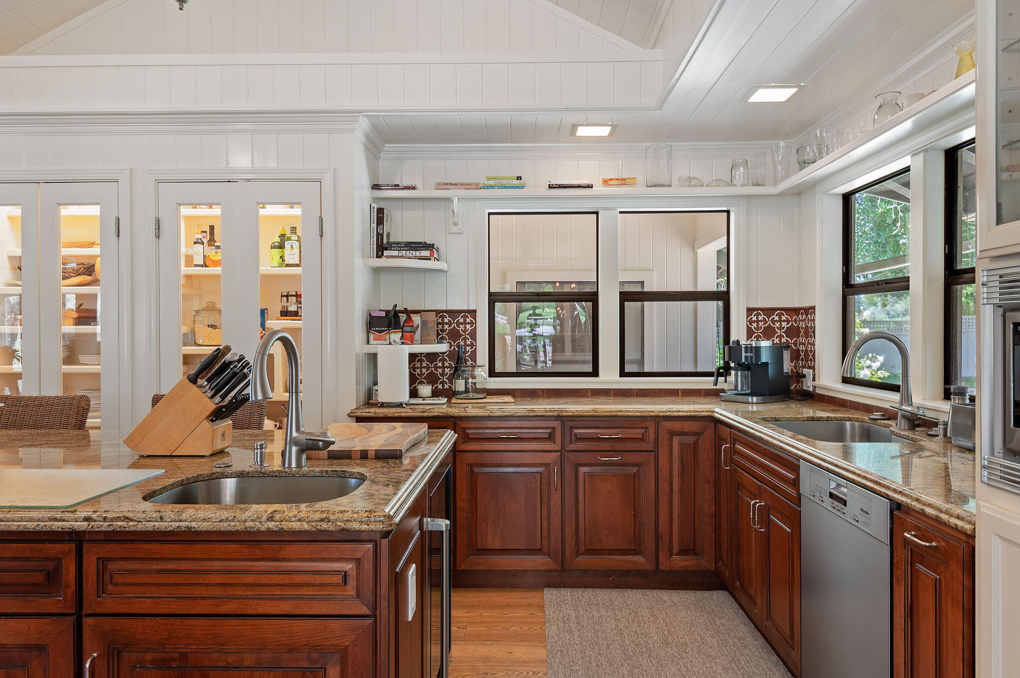 0 Still Meadow Road Solvang, CA 93463 - Photo 12 of 57 a kitchen with a sink stove and cabinets