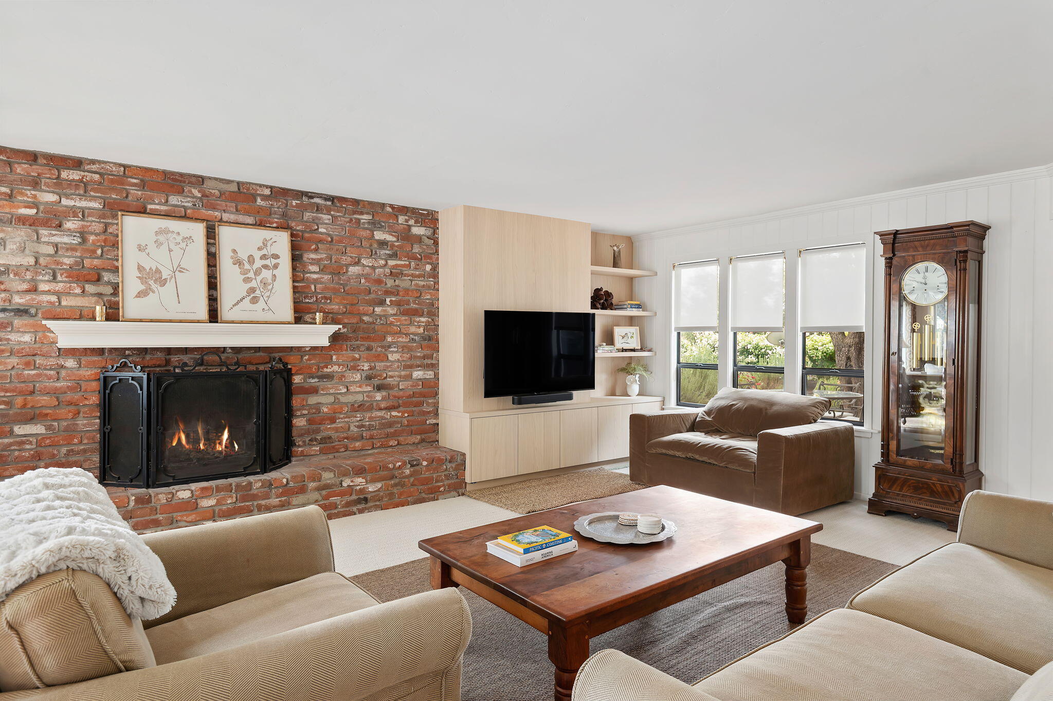 0 Still Meadow Road Solvang, CA 93463 - Photo 5 of 57 a living room with furniture a flat screen tv and a fireplace