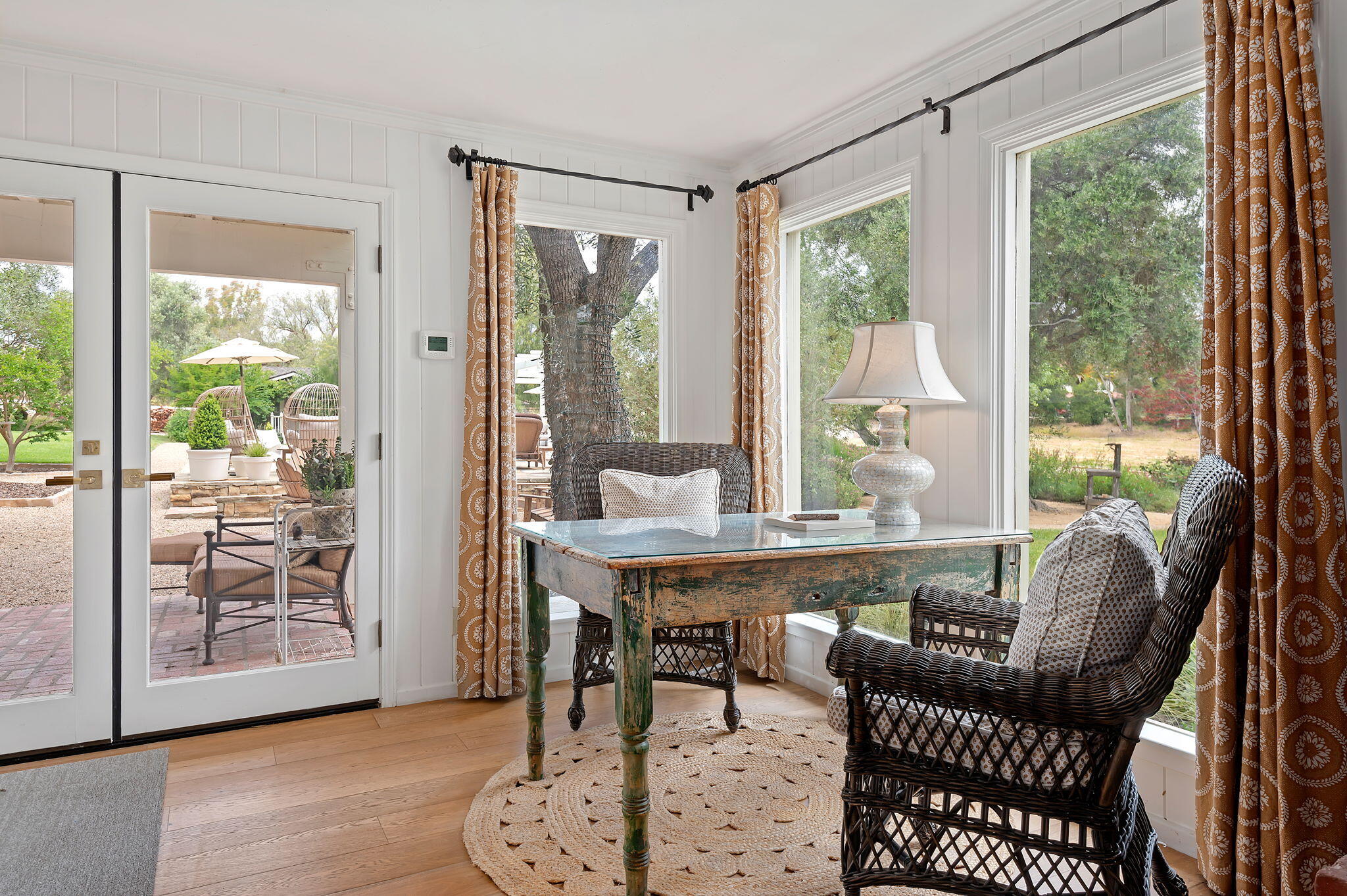 0 Still Meadow Road Solvang, CA 93463 - Photo 7 of 57 a dining room with furniture wooden floor and a potted plant