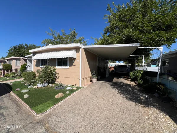 a view of a house with a patio