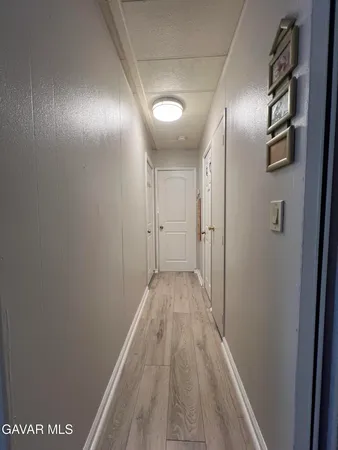 a bathroom with a sink double vanity and a shower