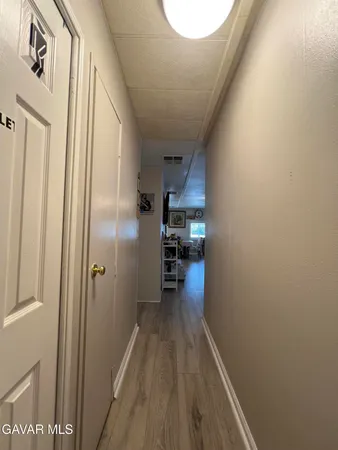 a bathroom with a toilet a sink and a shower