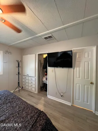 a bathroom with a shower and a toilet