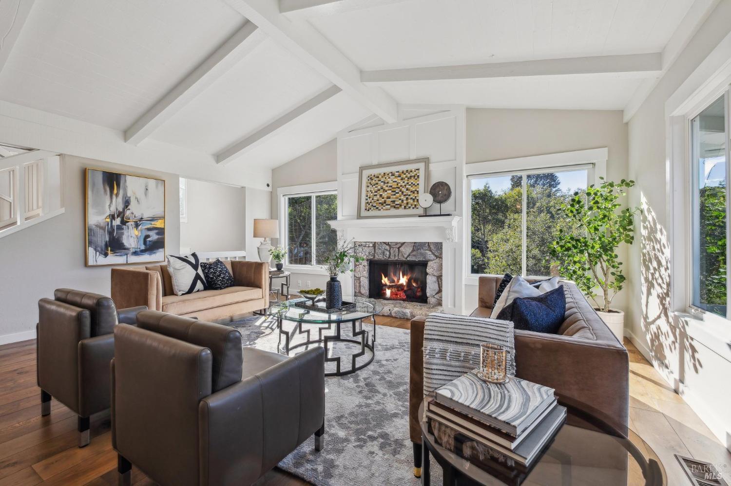981 Greenhill Road Mill Valley, CA 94941 - Photo 16 of 91 a living room with furniture a large window and a fireplace