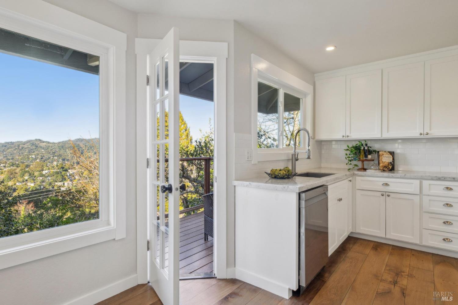 981 Greenhill Road Mill Valley, CA 94941 - Photo 25 of 91 a kitchen with granite countertop a stove and a white refrigerator