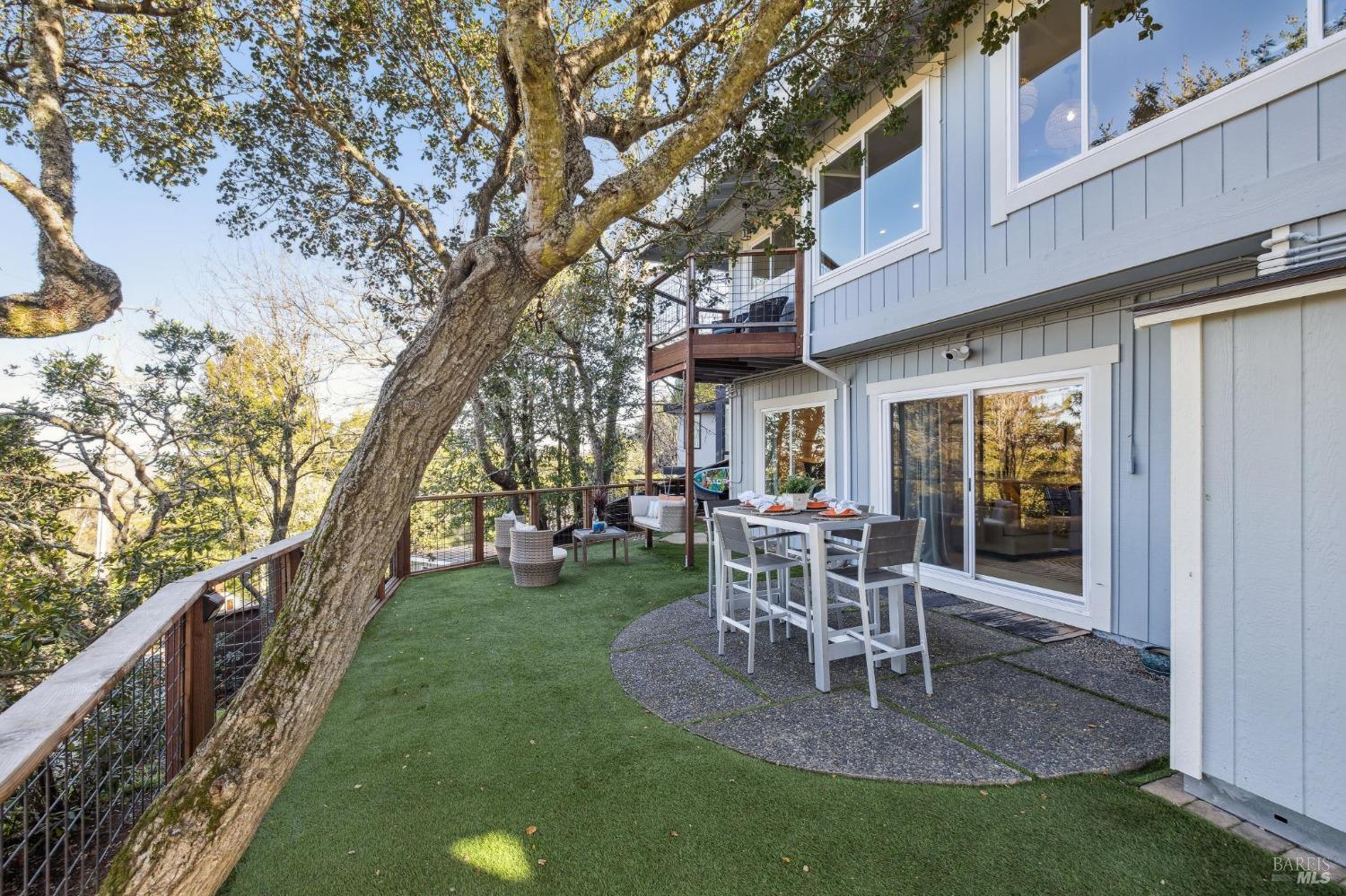 981 Greenhill Road Mill Valley, CA 94941 - Photo 7 of 91 a view of a house with backyard and sitting area