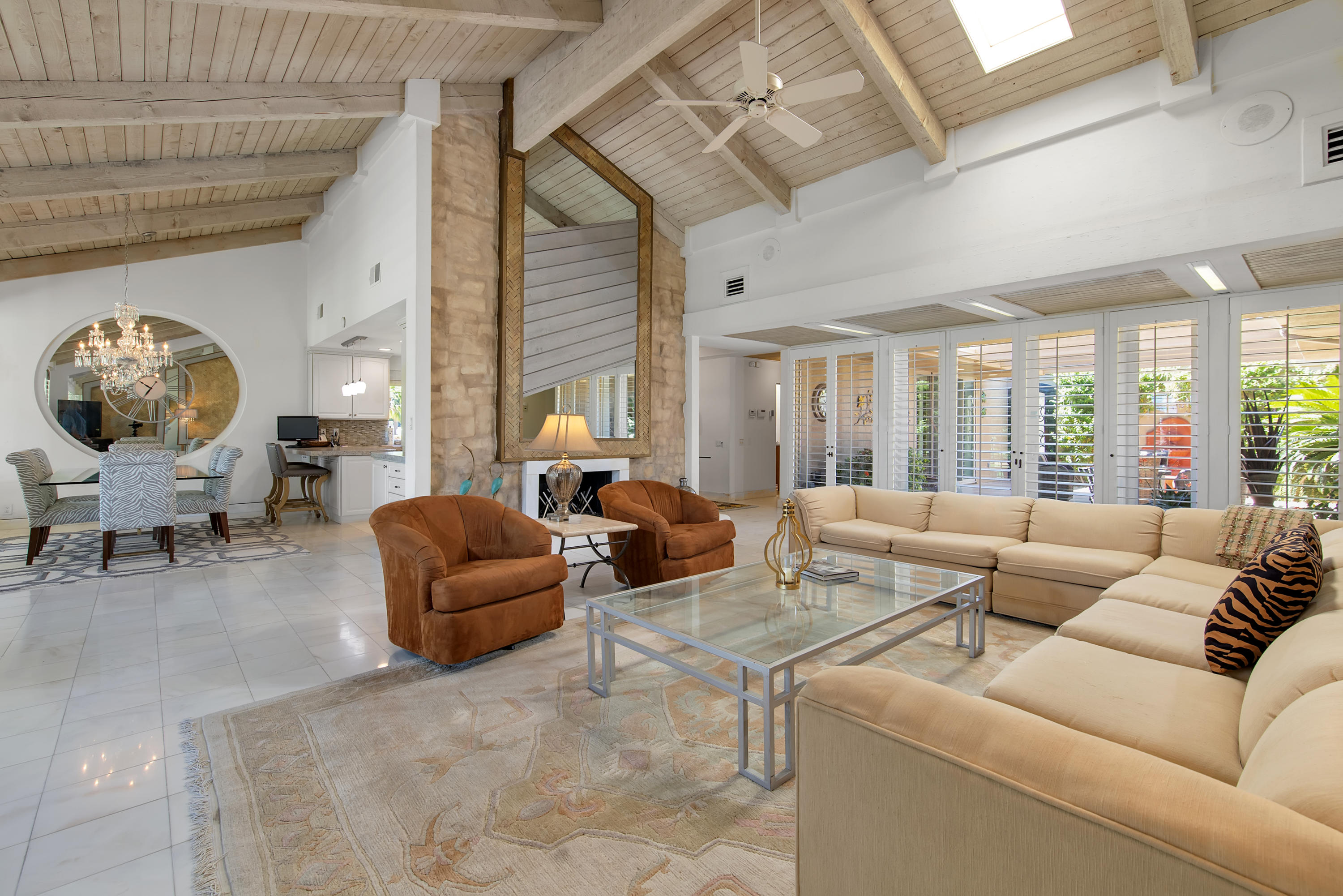 77920 Cherokee Road Indian Wells, CA 92210 - Photo 3 of 39 a living room with furniture and a large window
