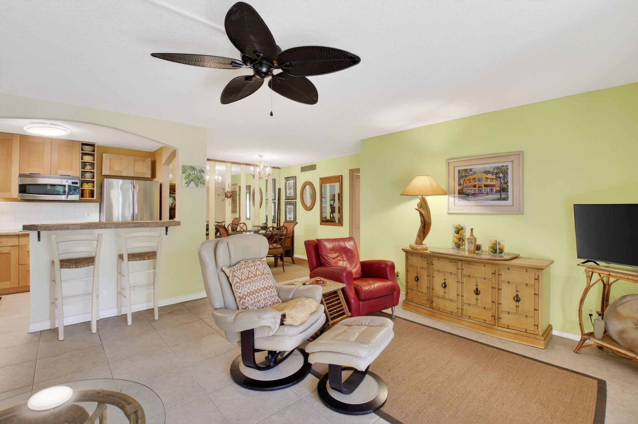 501 Dotterel Road, Unit 26B Delray Beach, FL 33444 - Photo 14 of 48 a living room with furniture