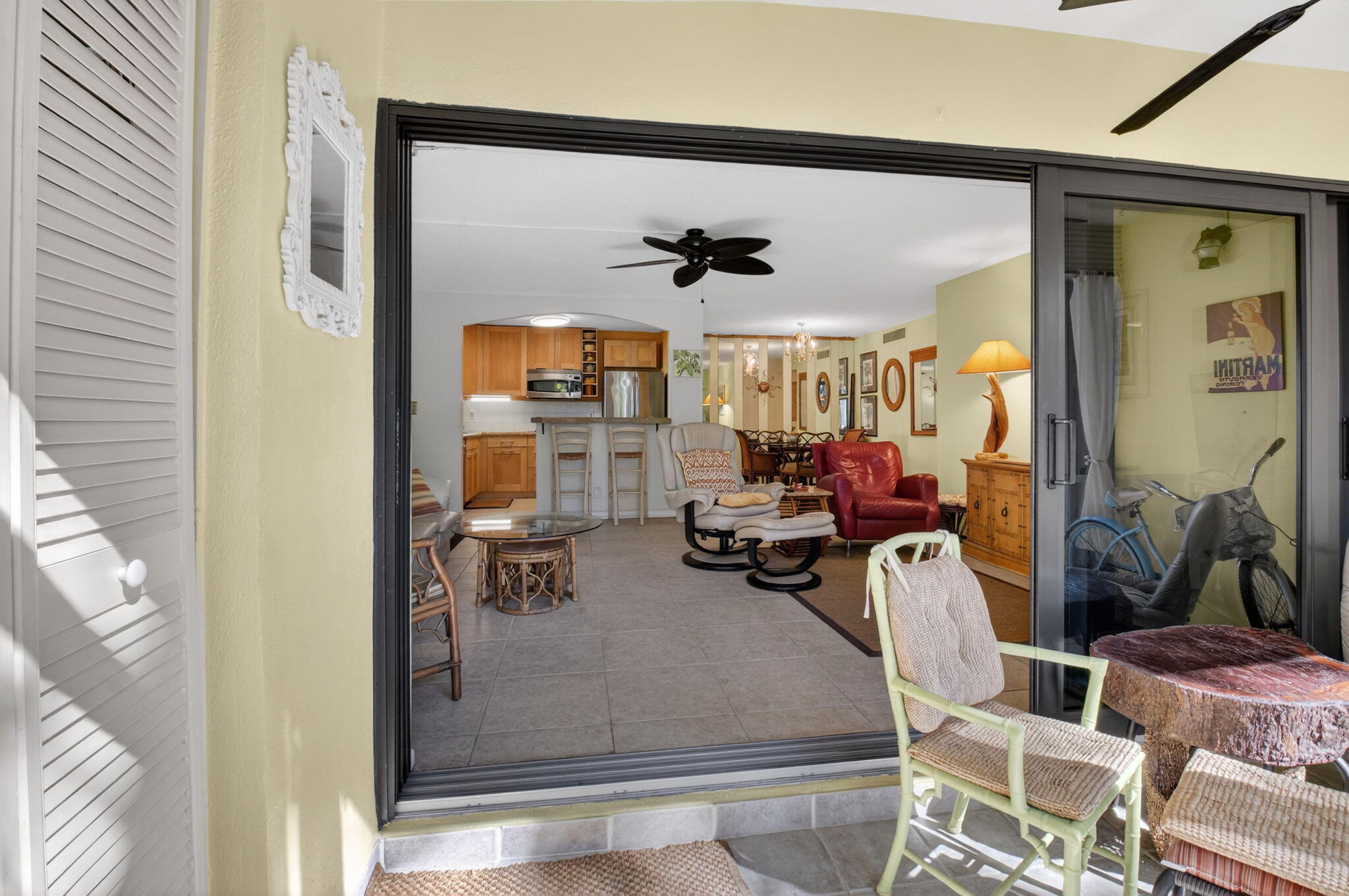 501 Dotterel Road, Unit 26B Delray Beach, FL 33444 - Photo 19 of 48 a view of a livingroom with furniture and a ceiling fan