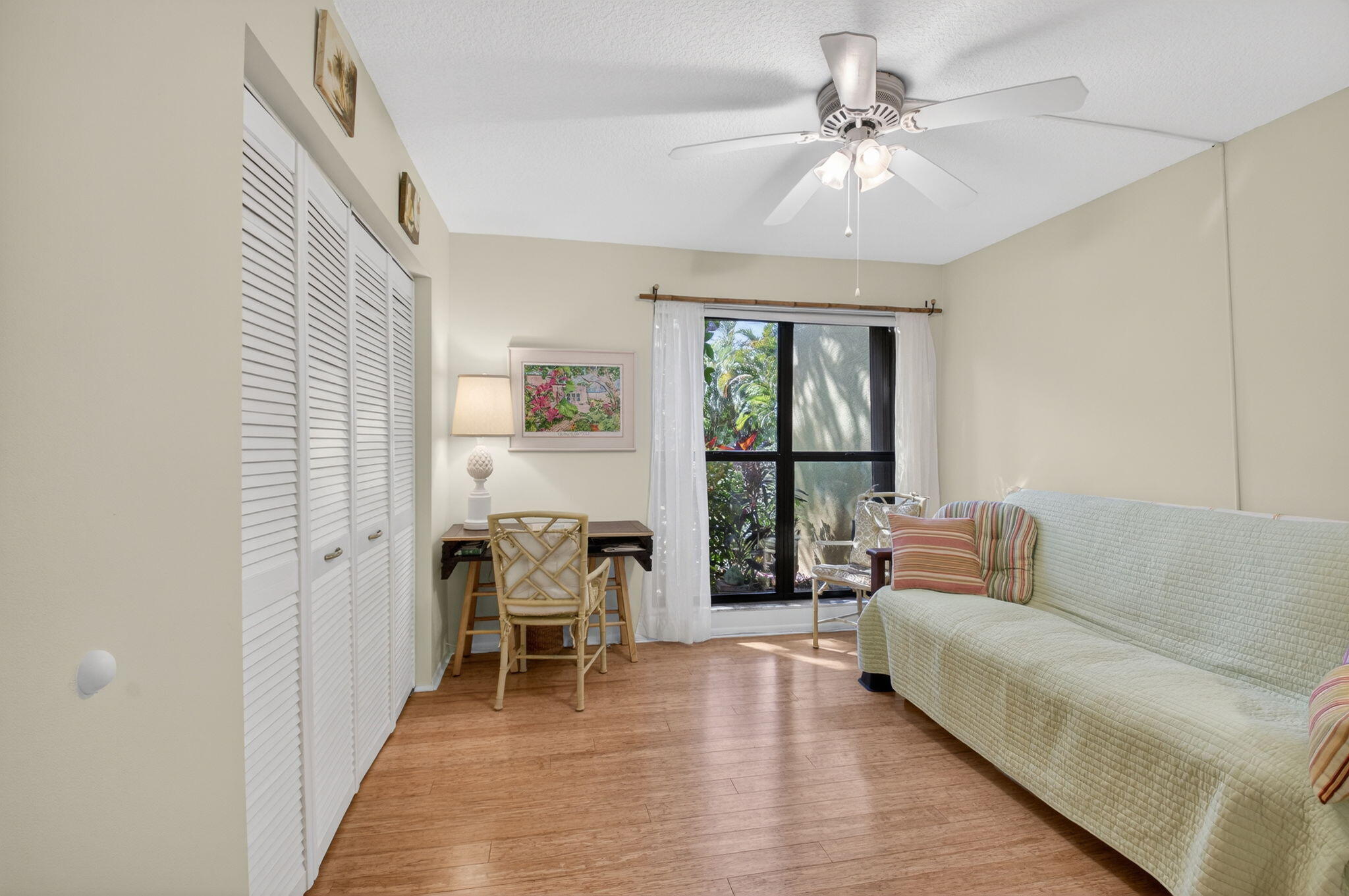 501 Dotterel Road, Unit 26B Delray Beach, FL 33444 - Photo 24 of 48 a living room with furniture and a large window
