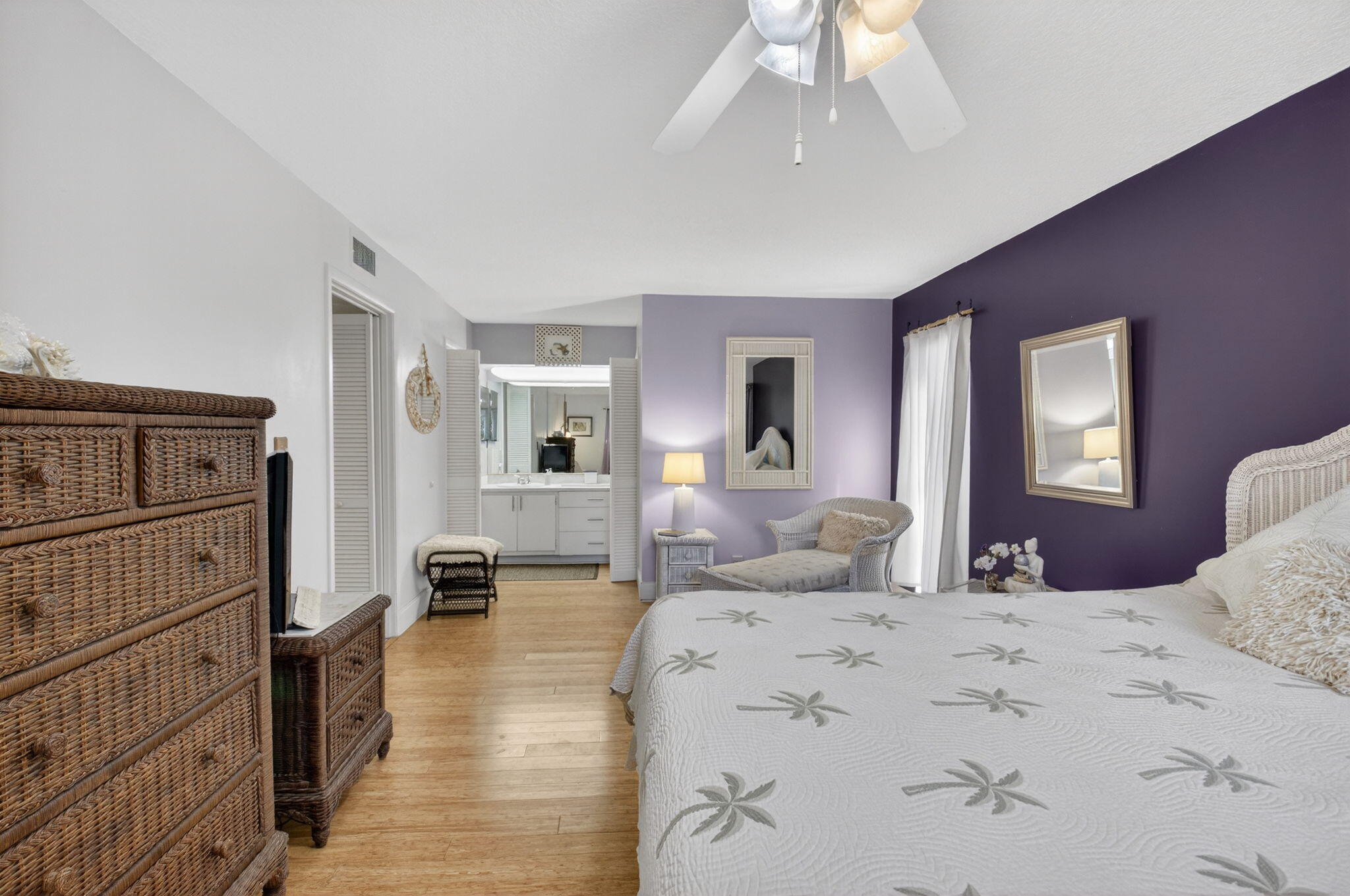 501 Dotterel Road, Unit 26B Delray Beach, FL 33444 - Photo 29 of 48 a bedroom with a bed and wooden floor