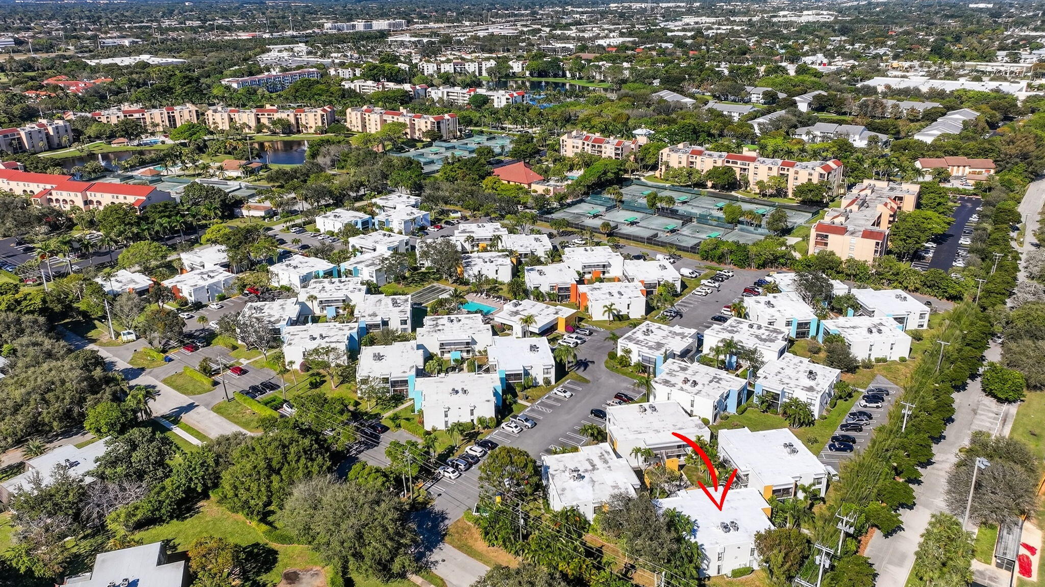 501 Dotterel Road, Unit 26B Delray Beach, FL 33444 - Photo 42 of 48 an aerial view of a city with lots of residential buildings