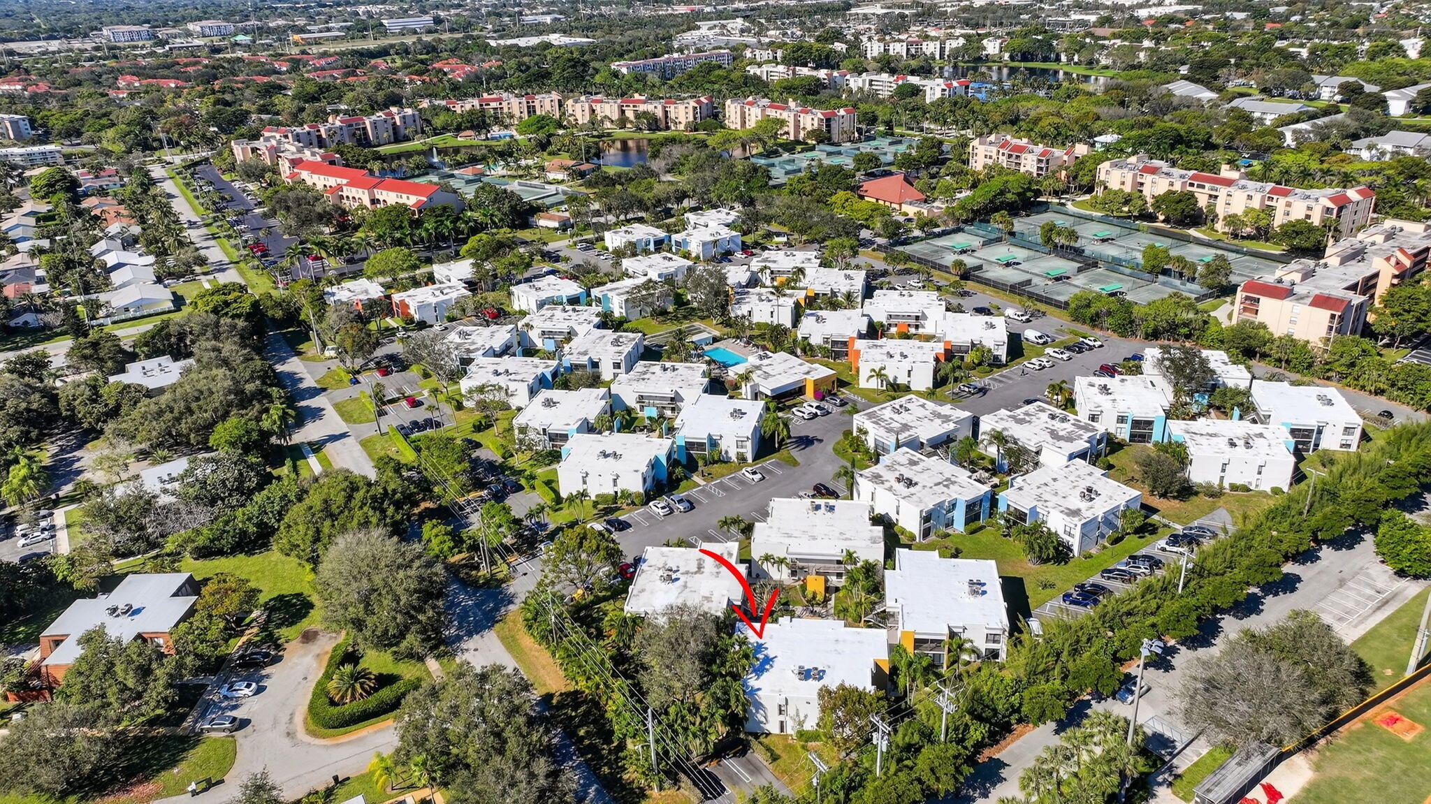 501 Dotterel Road, Unit 26B Delray Beach, FL 33444 - Photo 43 of 48 an aerial view of residential houses with outdoor space and trees