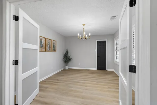 a view of a chandelier in a room