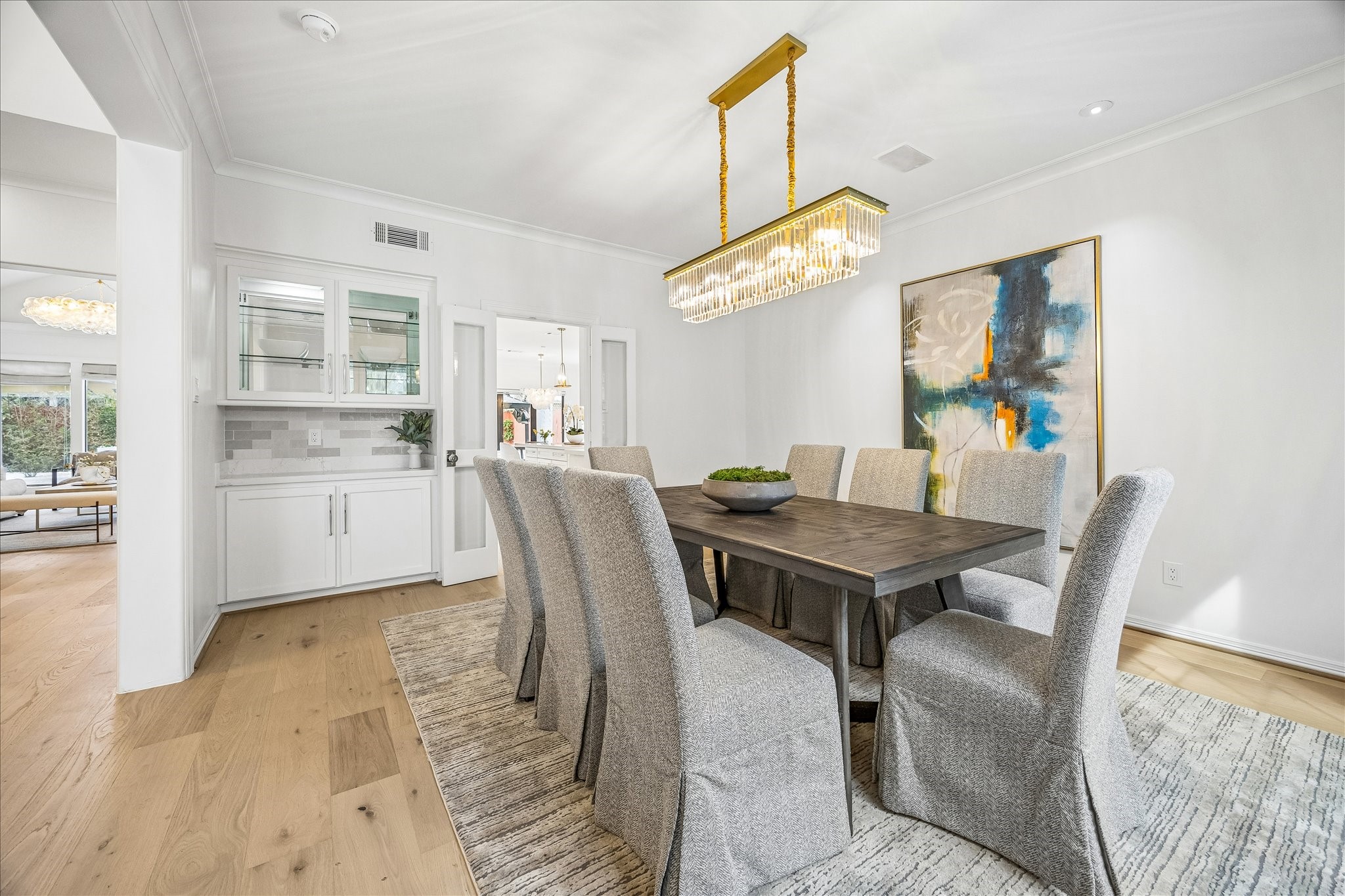 4614 Spruce Street Bellaire, TX 77401 - Photo 12 of 30 a view of a dining room with furniture