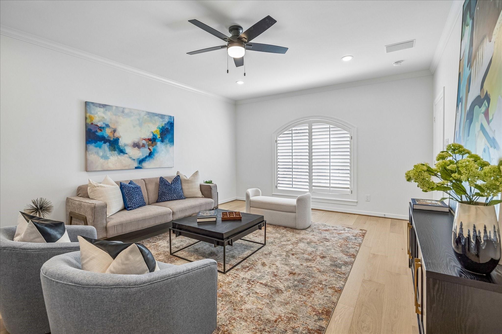 4614 Spruce Street Bellaire, TX 77401 - Photo 23 of 30 a living room with furniture and a large window
