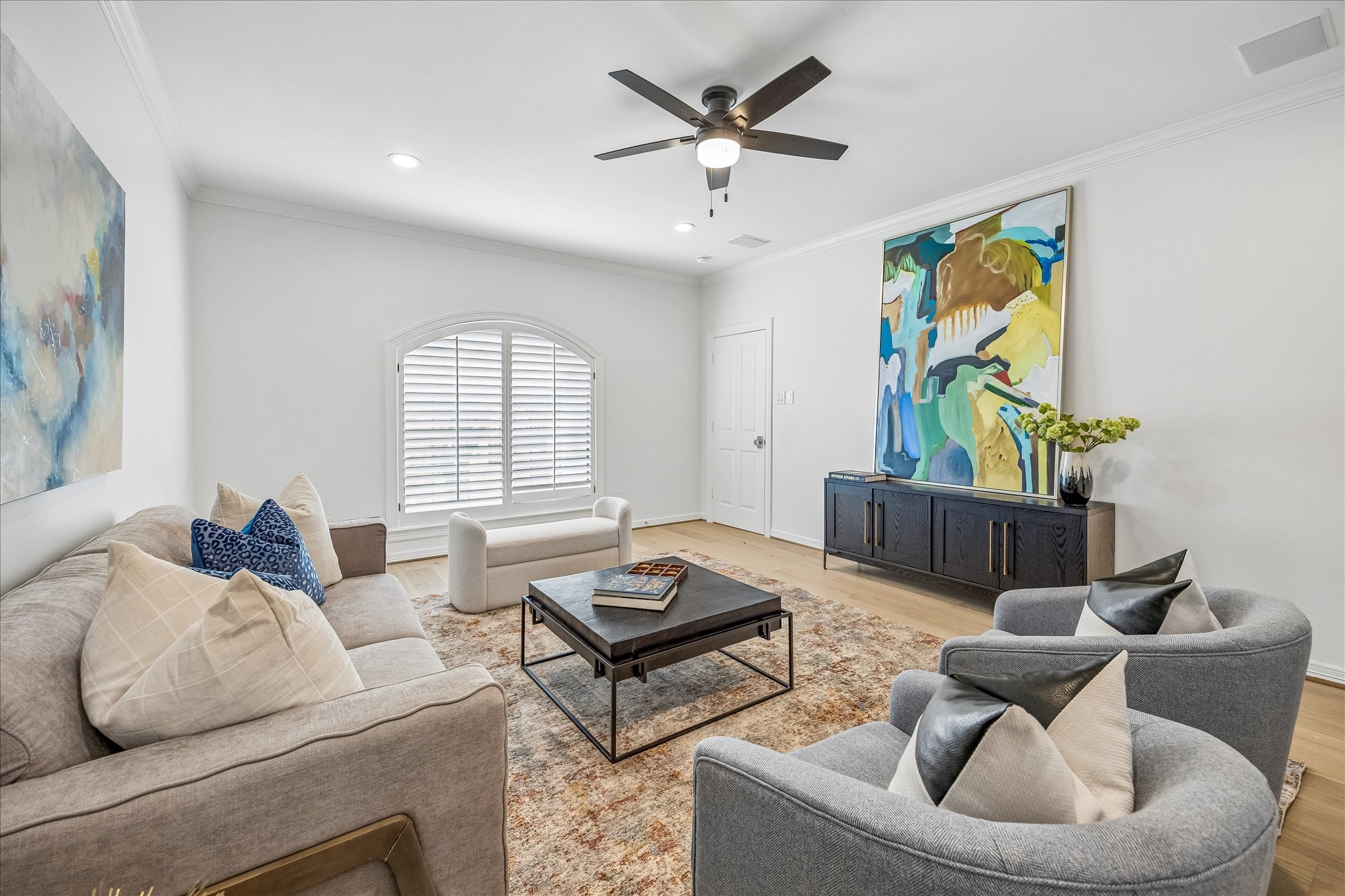 4614 Spruce Street Bellaire, TX 77401 - Photo 24 of 30 a living room with furniture and a window