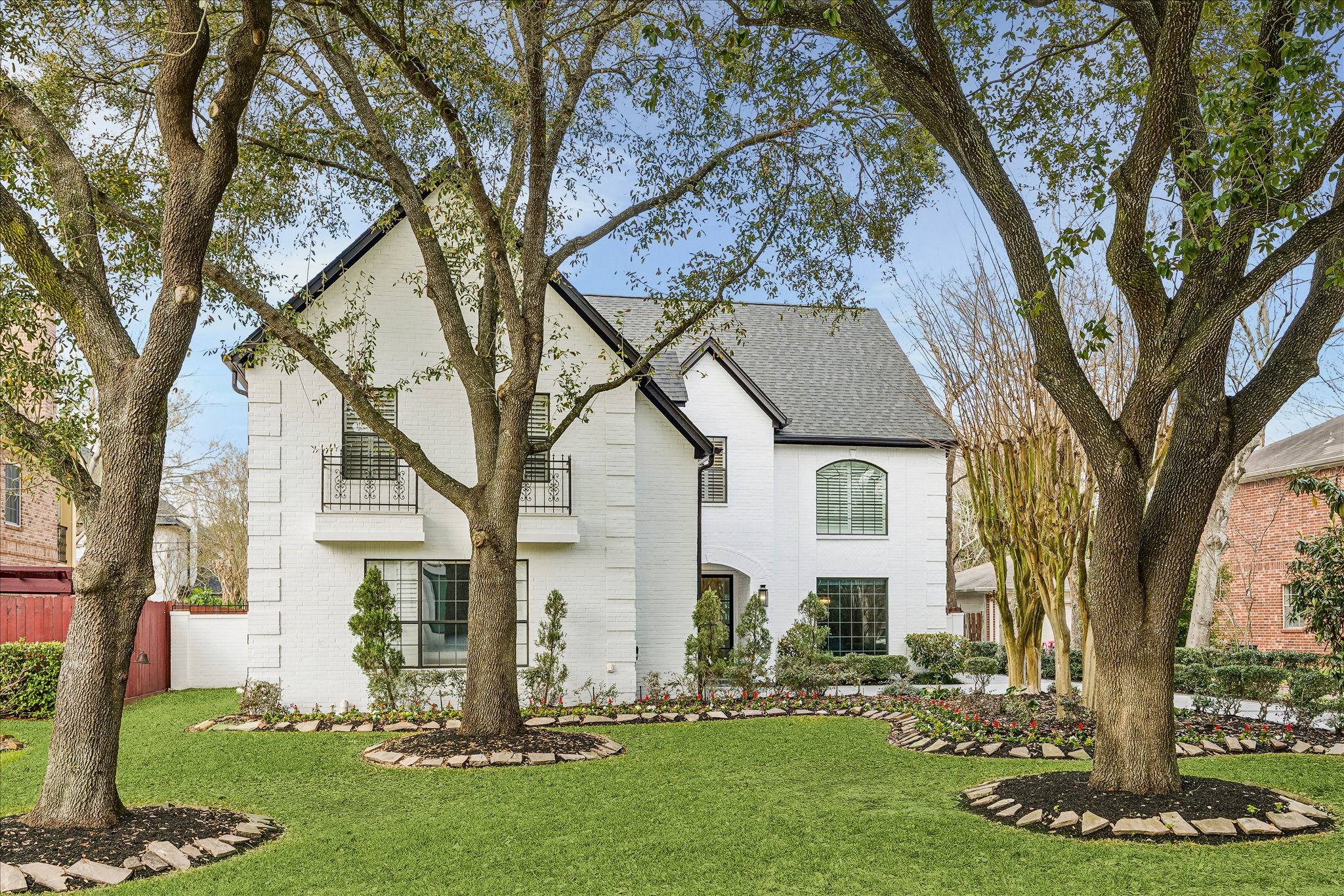 4614 Spruce Street Bellaire, TX 77401 - Photo 3 of 30 front view of house with a yard