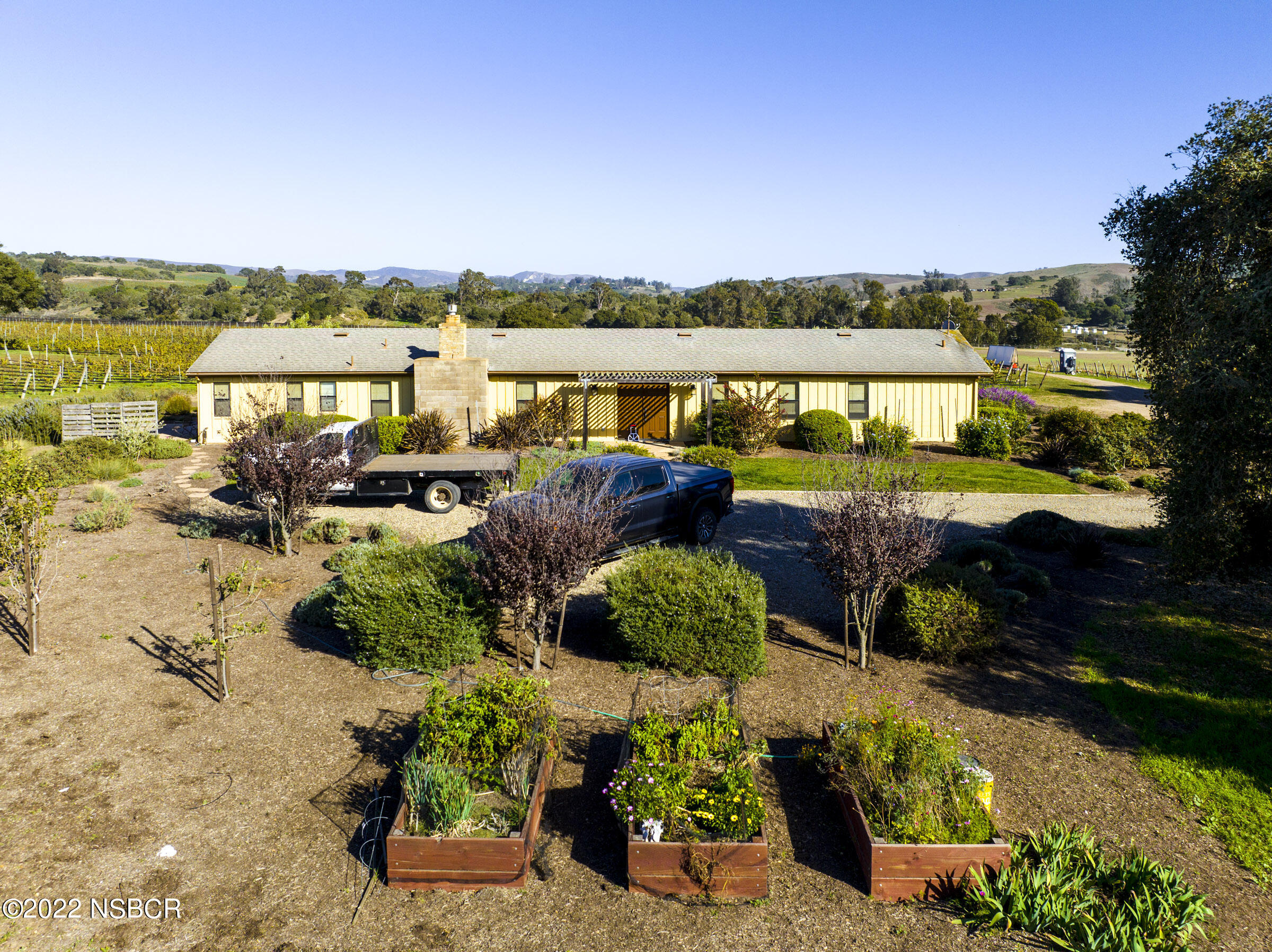 2755 Purisima Road Lompoc, CA 93436 - Photo 11 of 32 an aerial view of a house with a lake view