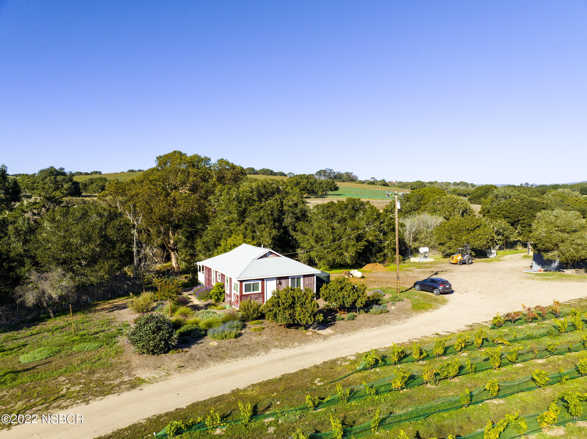 2755 Purisima Road Lompoc, CA 93436 - Photo 15 of 32 a view of a lake with a mountain in the background