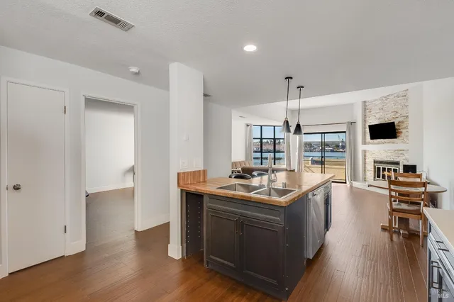 a kitchen with a table and chairs