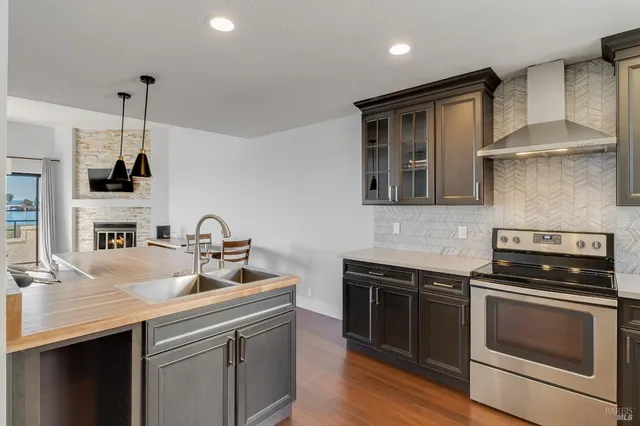 a living room with furniture fireplace and flat screen tv