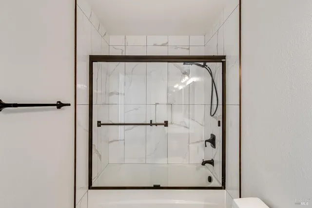 a view of multiple houses with yard