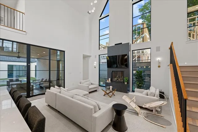 a bathroom with a granite countertop toilet sink and shower